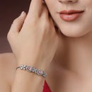 Rhodium Plated Silver Toned White Flower & Pink Teardrop American Diamond Studded  Wraparound Adjustable Bracelet