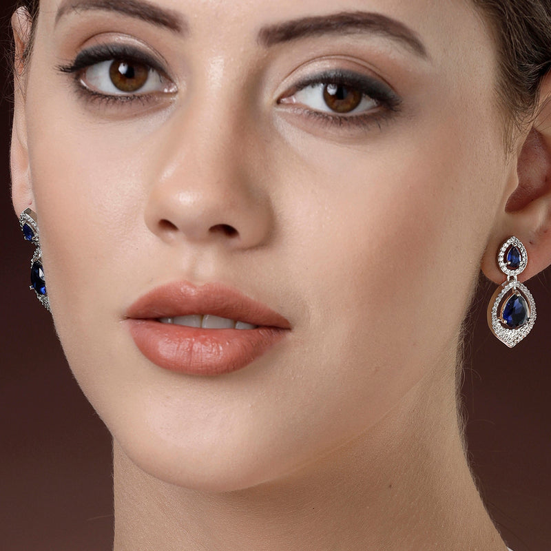 Rhodium Plated Silver Toned Blue Teardrop American Diamond Studded  Drop Earrings