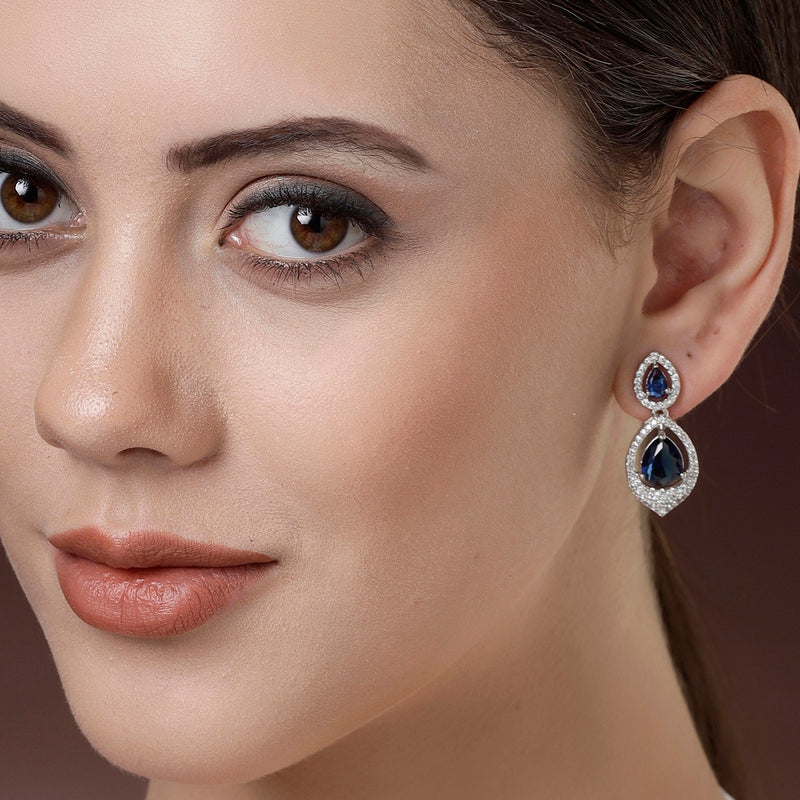 Rhodium Plated Silver Toned Blue Teardrop American Diamond Studded  Drop Earrings