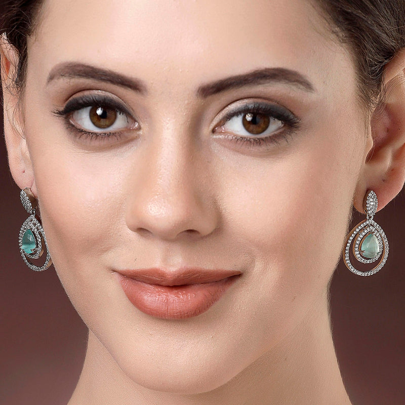 Rhodium Plated Silver Toned with Teardrop Shaped Ocean Blue & White American Diamond Drop Earrings