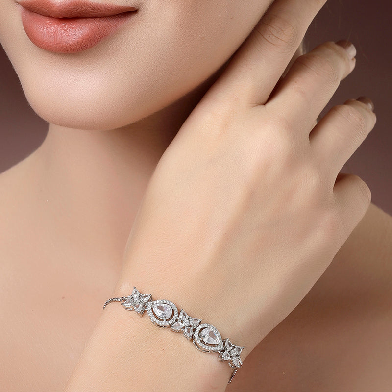 Rhodium Plated Silver Toned White Flower & Teardrop American Diamond Studded Wraparound Adjustable Bracelet