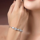 Rhodium Plated Silver Toned White Round & Oval American Diamond Studded  Wraparound Adjustable Bracelet