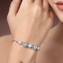 Rhodium Plated Silver Toned White Round & Oval American Diamond Studded  Wraparound Adjustable Bracelet
