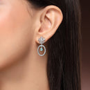 Rhodium Plated Silver Toned Floral Oval Shaped Sea Green &White American Diamond Studded Drop Earrings