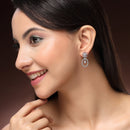 Rhodium Plated Silver Toned Floral Oval Shaped White American Diamond Studded Drop Earrings