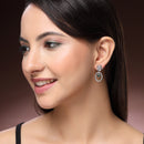 Rhodium Plated Silver Toned Floral Oval Shaped Green & White American Diamond Studded Drop Earrings