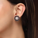 Rhodium Plated Silver Toned Floral Shaped Blue & White American Diamond & Pearl Studded Stud Earrings