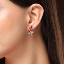 Rhodium Plated Silver Toned Floral Shaped Red & White American Diamond Studded Stud Earrings