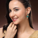 Traditional Gold Plated Oval Shaped Green Stone And Pearl Studded Earrings