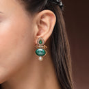 Traditional Gold Plated Oval Shaped Green Stone And Pearl Studded Earrings