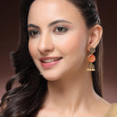 Traditional Gold Plated Pearl Studded Twist Drop Shaped Statement Jhumka Earrings