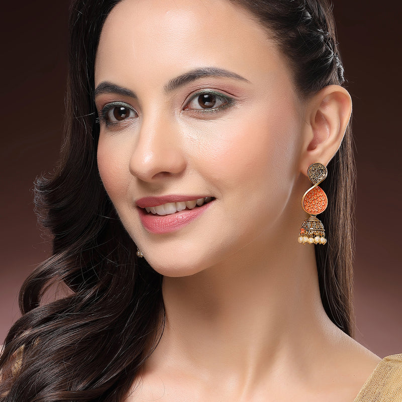 Traditional Gold Plated Pearl Studded Twist Drop Shaped Statement Jhumka Earrings