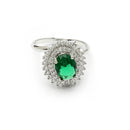 Rhodium Plated Silver Toned Oval Shaped Emarald Green American Diamond Studded Pendant Combo With Ring