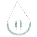 Rhodium Plated Silver Toned Sea Green Floral American Diamond Studded Necklace With Matching Earrings