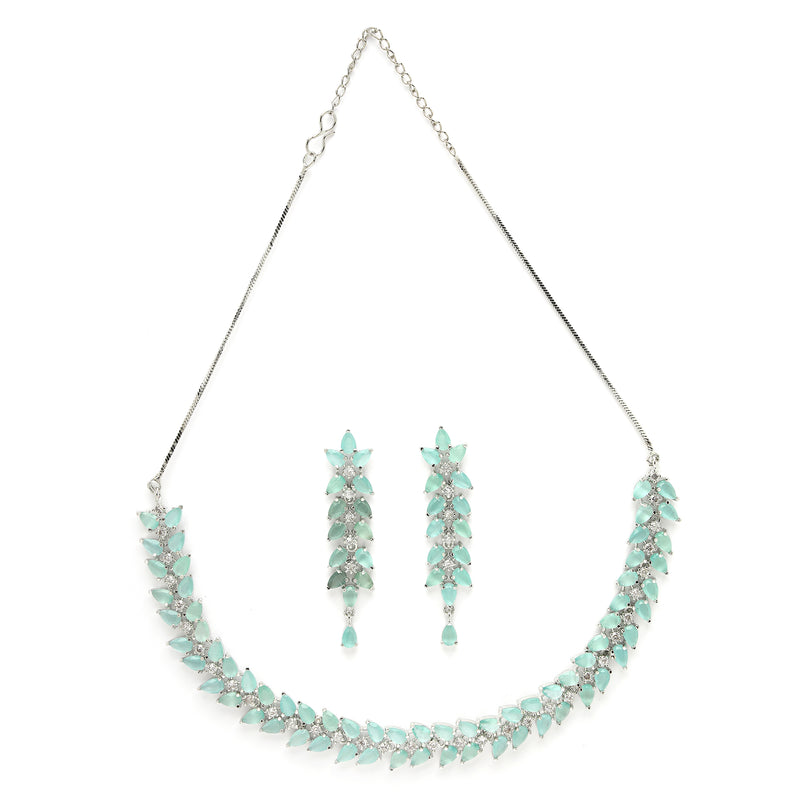 Rhodium Plated Silver Toned Sea Green Floral American Diamond Studded Necklace With Matching Earrings