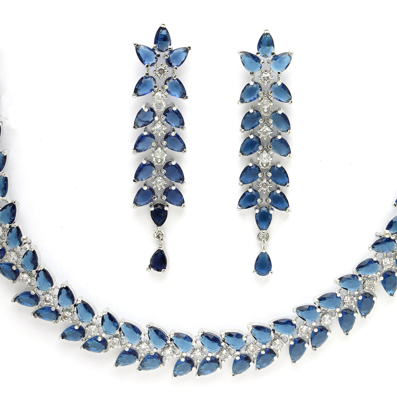 Rhodium Plated Silver Toned Blue Floral American Diamond Studded Necklace With Matching Earrings