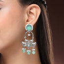 Oxidised Floral Shaped Mint Green CZ Studded And Pearl Beaded Dangler Earrings
