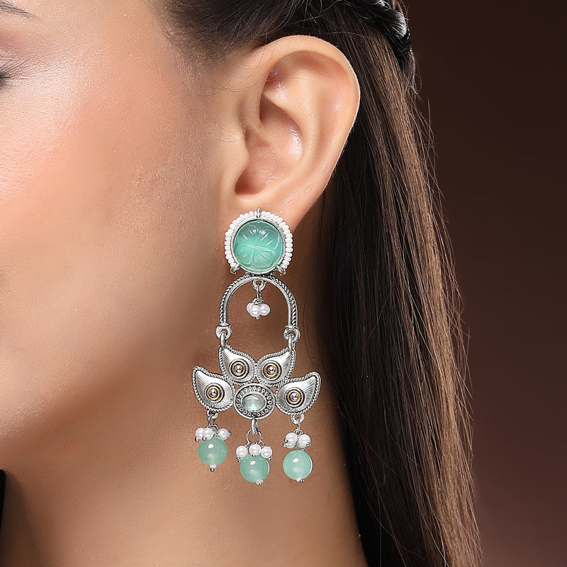 Oxidised Floral Shaped Mint Green CZ Studded And Pearl Beaded Dangler Earrings