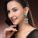 Oxidised Floral Shaped Mint Green CZ Studded And Pearl Beaded Dangler Earrings