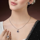 Rhodium Plated Silver Toned Violet American Diamond Studded Pendant Combo With Ring