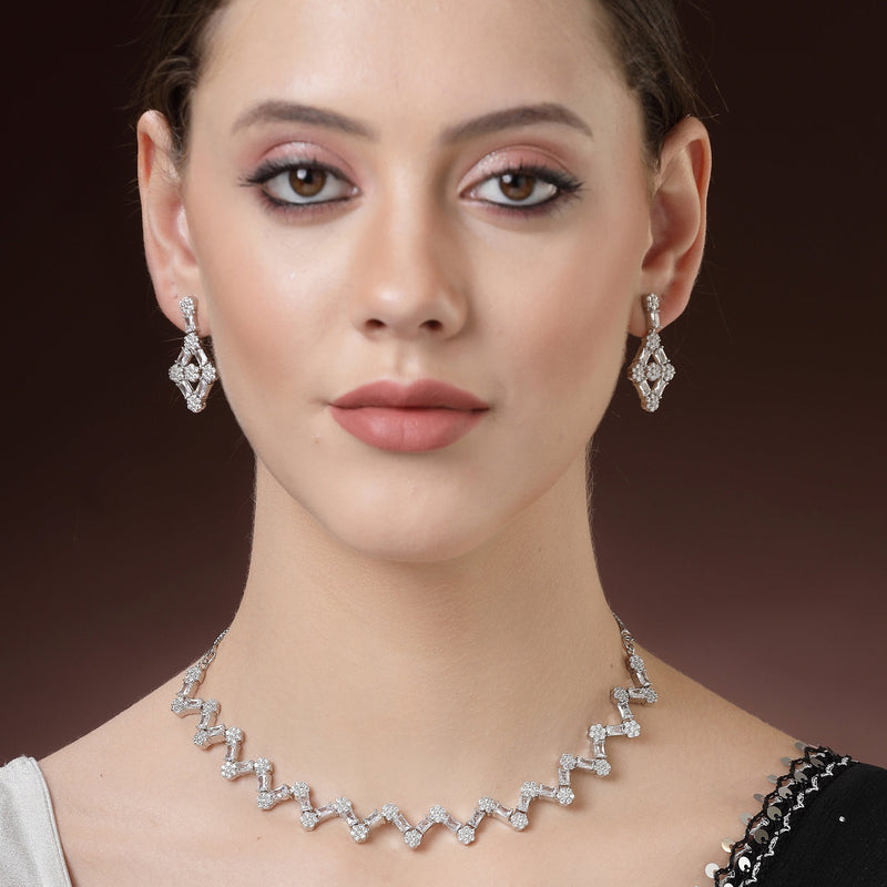 Rhodium Plated Silver Toned Zig Zag Design White AD Studded Necklace Set With Earrings