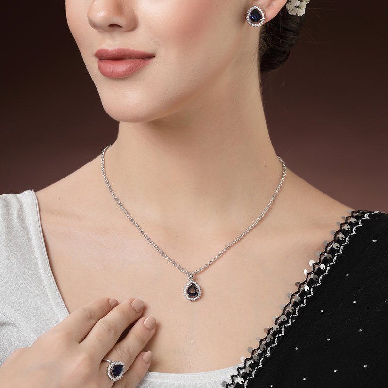 Rhodium Plated Silver Toned Tear Dropped Shaped Royal Blue American Diamond Studded Pendant Combo With Ring
