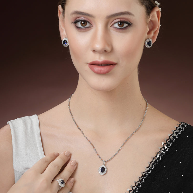 Rhodium Plated Silver Toned Oval Shaped Violet American Diamond Studded Pendant Combo With Ring