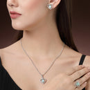 Rhodium Plated Silver Toned Heart Shaped Sea Blue American Diamond Studded Pendant Combo With Ring