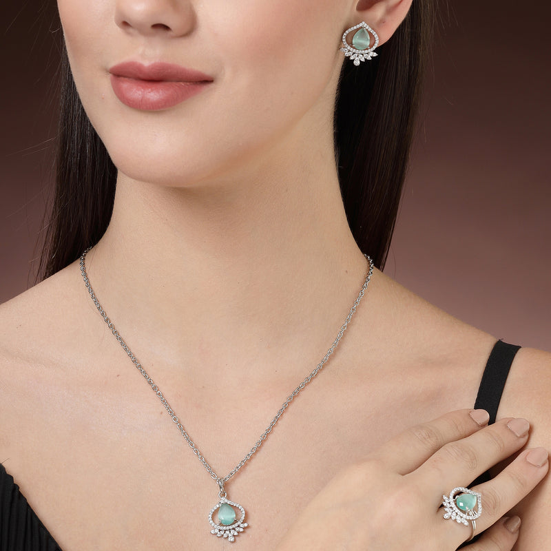 Rhodium Plated Silver Toned Sea Blue Tear Dropped Shaped American Diamond Studded Pendant Combo With Ring