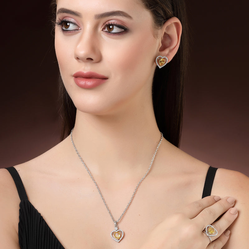 Rhodium Plated Silver Toned Heart Shaped Yellow American Diamond Studded Pendant Combo With Ring