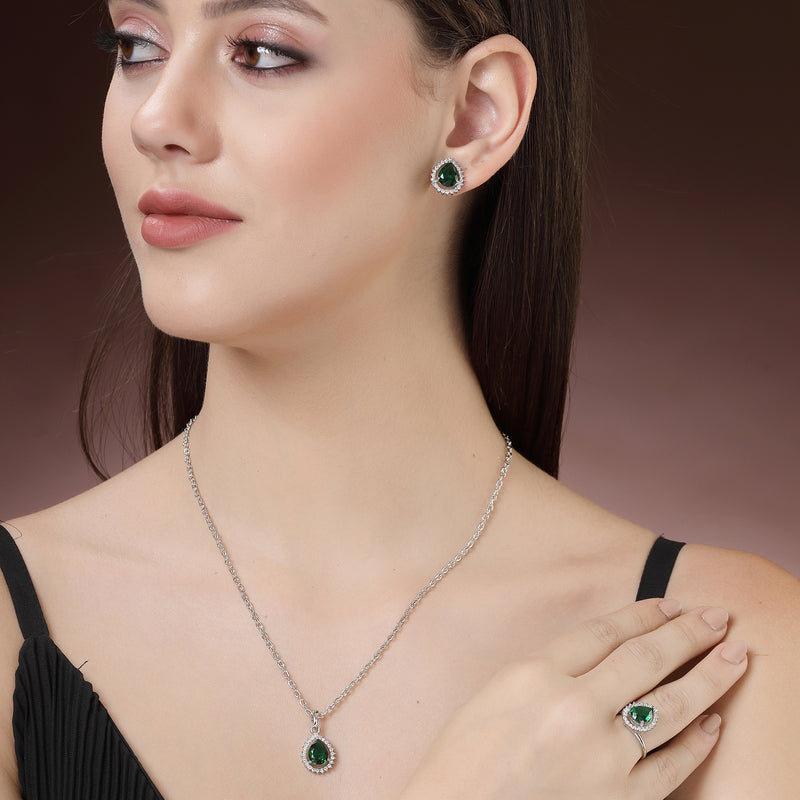 Rhodium Plated Silver Toned Tear Dropped Shaped Emerald Green American Diamond Studded Pendant Combo With Ring