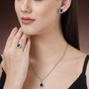 Rhodium Plated Silver Toned Tear Dropped Shaped Emerald Green American Diamond Studded Pendant Combo With Ring