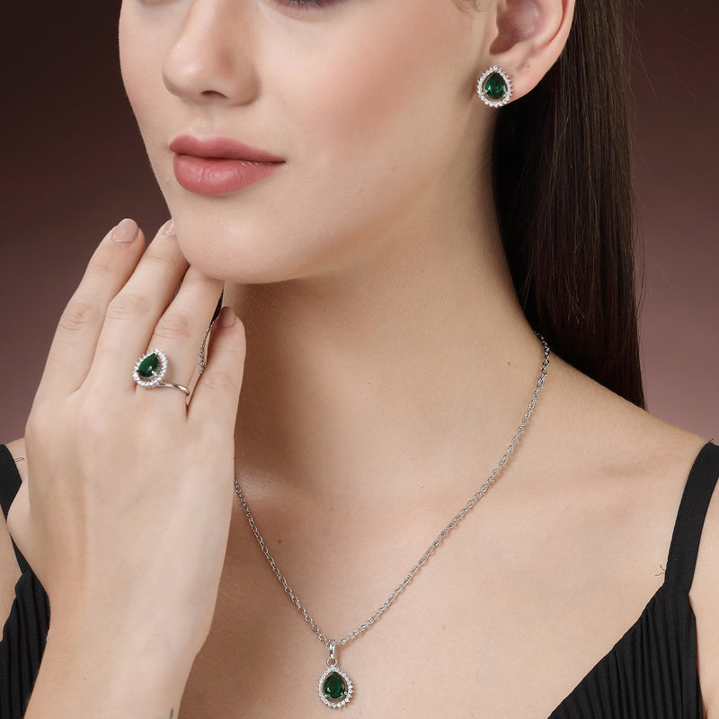 Rhodium Plated Silver Toned Tear Dropped Shaped Emerald Green American Diamond Studded Pendant Combo With Ring
