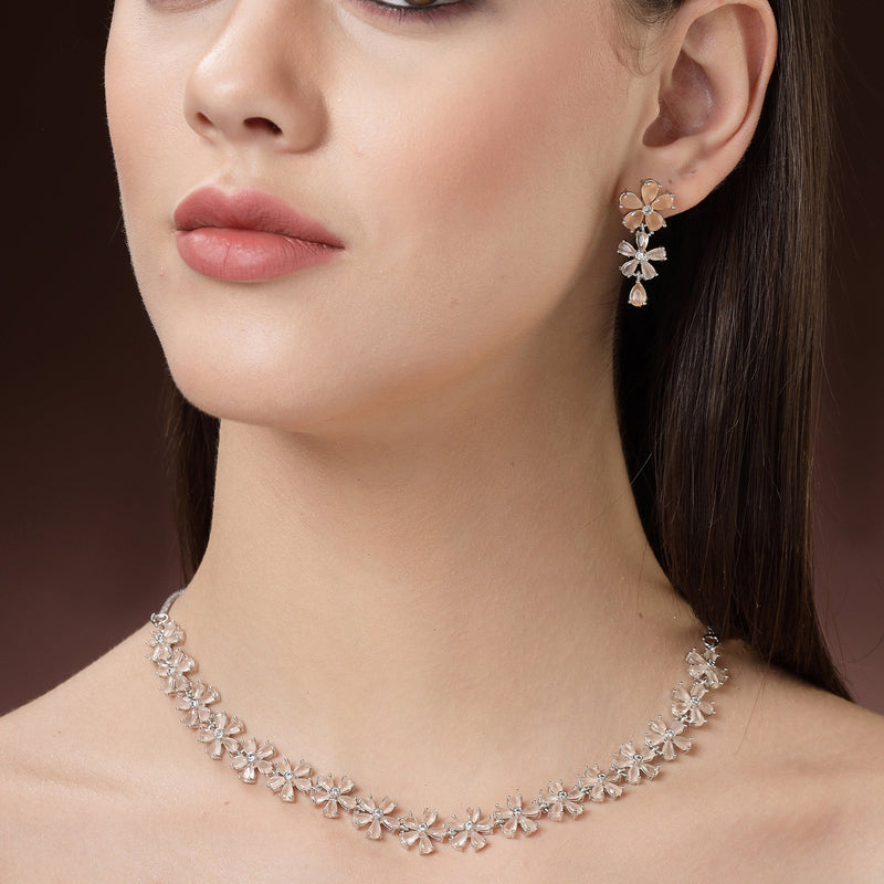 Rhodium Plated Silver Toned Floral Design Orange American Diamond Studded  Necklace With Matching Drop Earrings