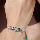 Zeneme Rhodium Plated Silver Toned White Round & Green Rectangle American Diamond Studded  Wraparound Adjustable Bracelet