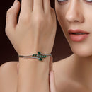 Rhodium Plated Silver Toned Leaf Design Green Teardrop American Diamond Studded Cuff Bracelet