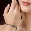 Rhodium Plated Silver Toned Nature Inspired Green Oval American Diamond Studded Cuff Bracelet