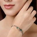 Rhodium Plated Silver Toned Nature Inspired Green Oval American Diamond Studded Cuff Bracelet