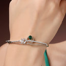 Rhodium Plated Silver Toned Green Teardrop American Diamond Studded Cuff Bracelet