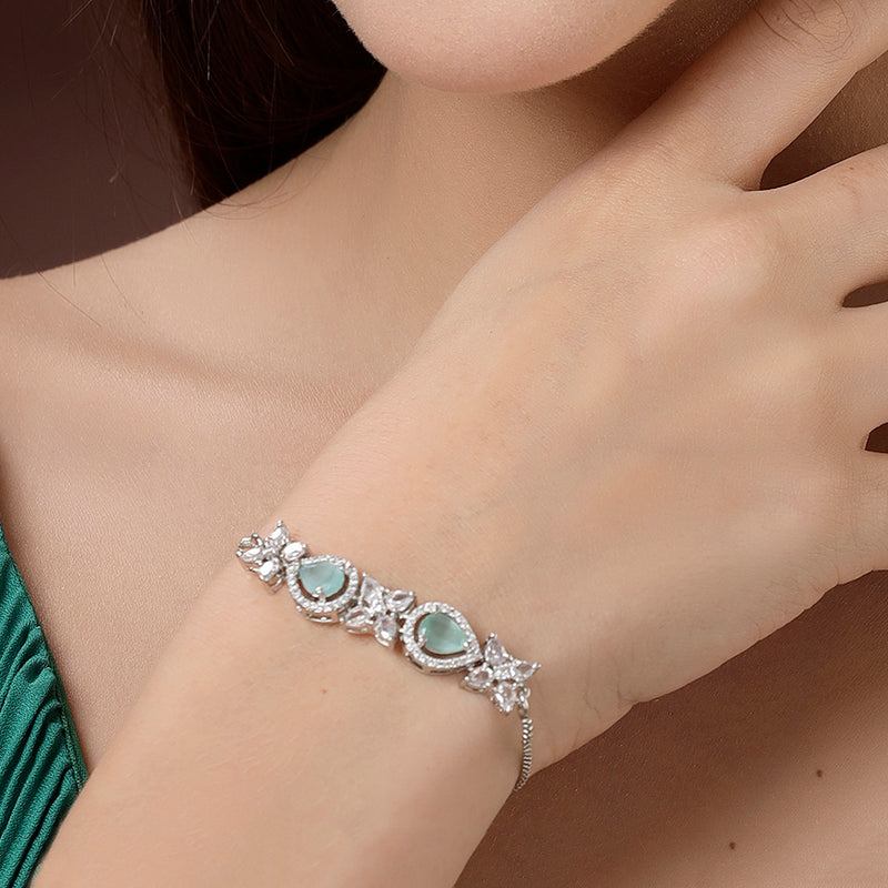 Rhodium Plated Silver Toned White Flower & Mint Green Teardrop American Diamond Studded Wraparound Adjustable Bracelet