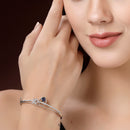 Rhodium Plated Silver Toned Blue Teardrop American Diamond Studded Cuff Bracelet