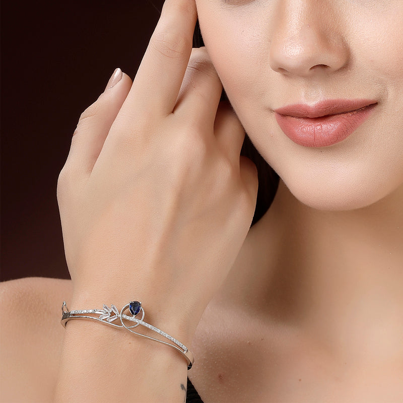 Rhodium Plated Silver Toned Blue Teardrop American Diamond Studded Cuff Bracelet