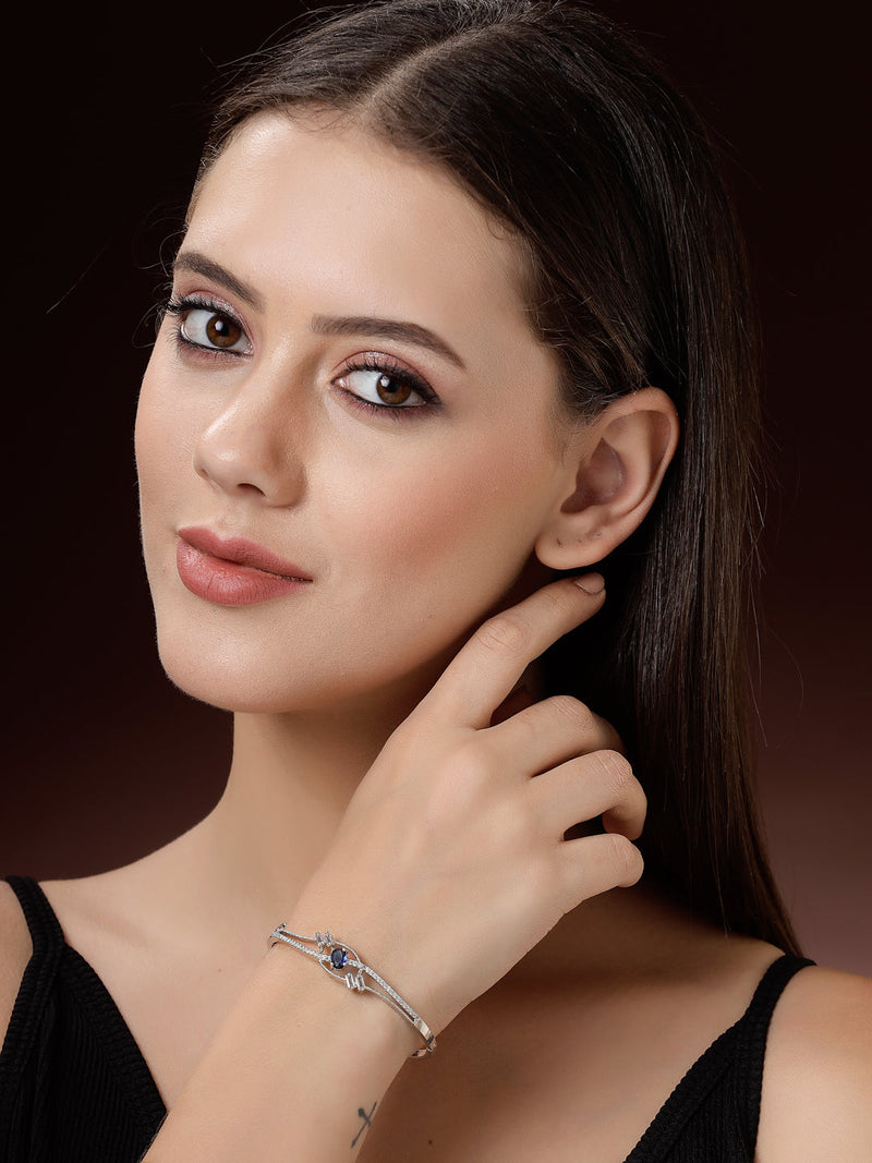Rhodium Plated Silver Toned Blue Oval American Diamond Studded Cuff Bracelet