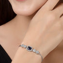 Rhodium Plated Silver Toned Blue Square Centerpiece Ad Studded Bracelet With Beads & Floral Accents  Wraparound Adjustable Bracelet