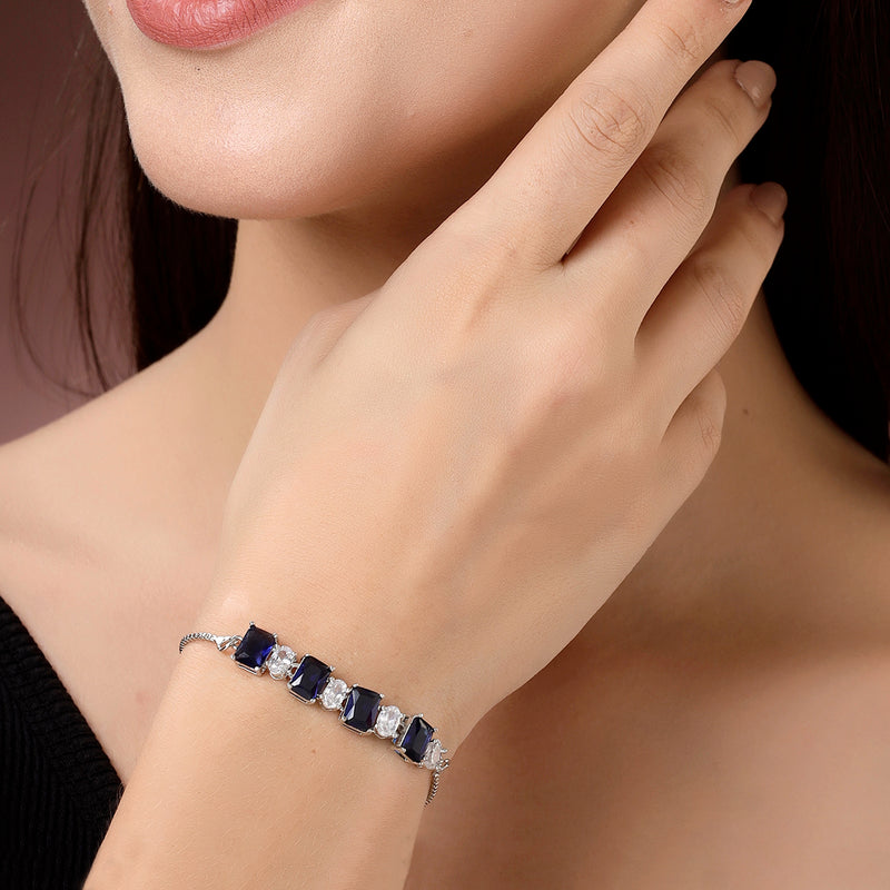 Rhodium Plated Silver Toned White Round & Blue Square Cut Studded Wraparound Adjustable Bracelet