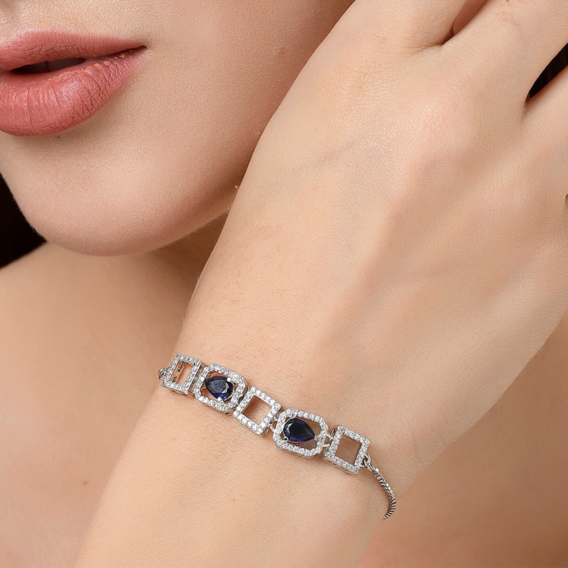 Rhodium Plated Silver Toned White Square Cut Blue Teardrop Ad Studded Wraparound Adjustable Bracelet