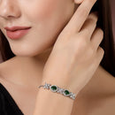 Rhodium Plated Silver Toned White Flower & Green Teardrop AD Studded Wraparound Adjustable Bracelet