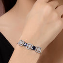 Rhodium Plated Silver Toned White Round & Blue Rectangle American Diamond Wraparound Adjustable Bracelet