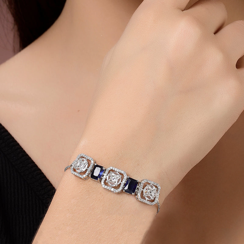 Rhodium Plated Silver Toned White Round & Blue Rectangle American Diamond Wraparound Adjustable Bracelet