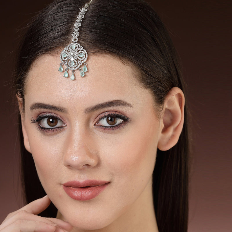 Rhodium Plated Silver Toned Floral Mint Green American Diamond Studded Maang Tikka with Elegant Dangling Stones